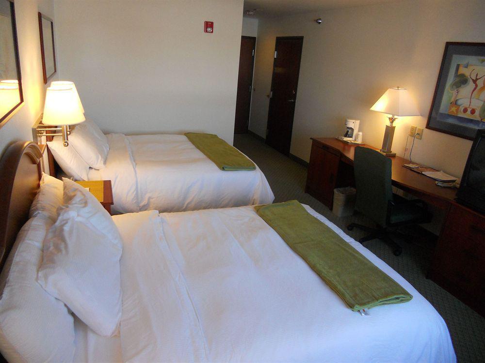 Crossings By Grandstay Inn & Suites Becker Экстерьер фото