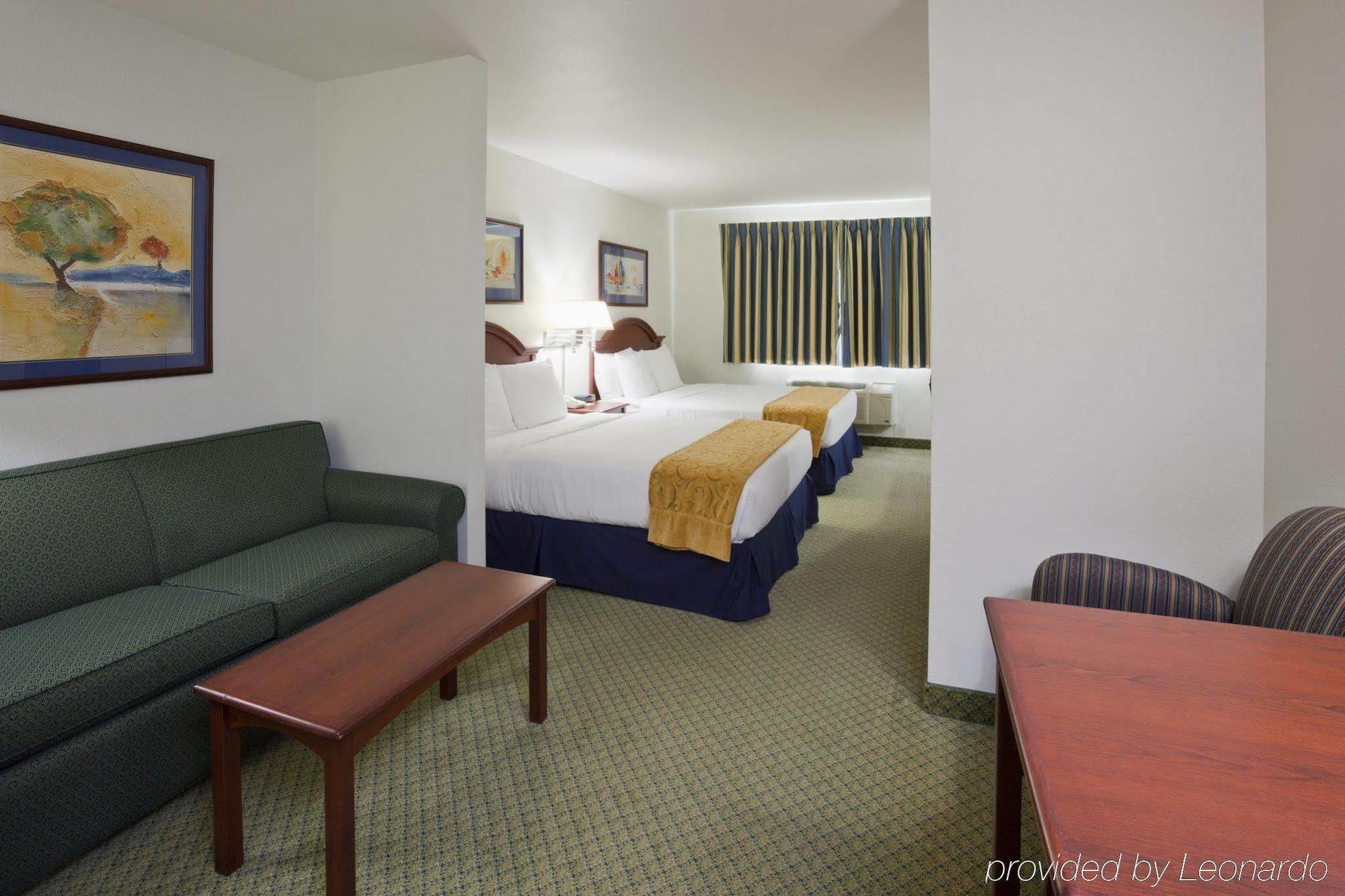 Crossings By Grandstay Inn & Suites Becker Экстерьер фото
